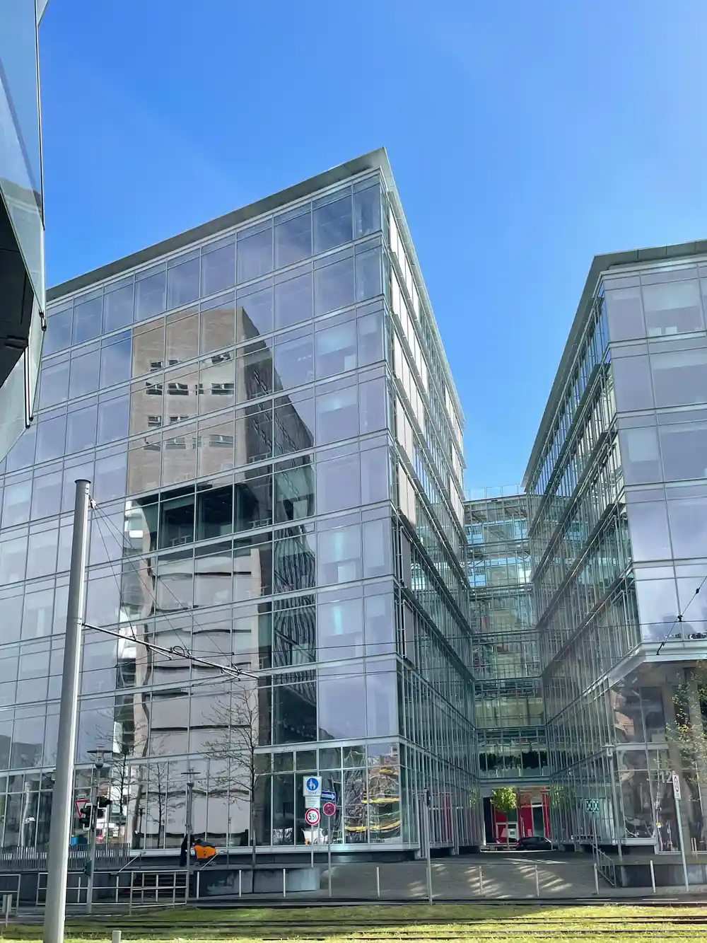 Glass-fronted modern office buildings with angular design